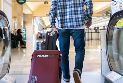 Wheeled injection-molded case in an airport